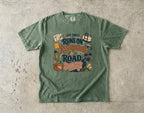 Our Family Runs on Reservations and Road Snacks Road Trip Shirt in Moss – flat lay