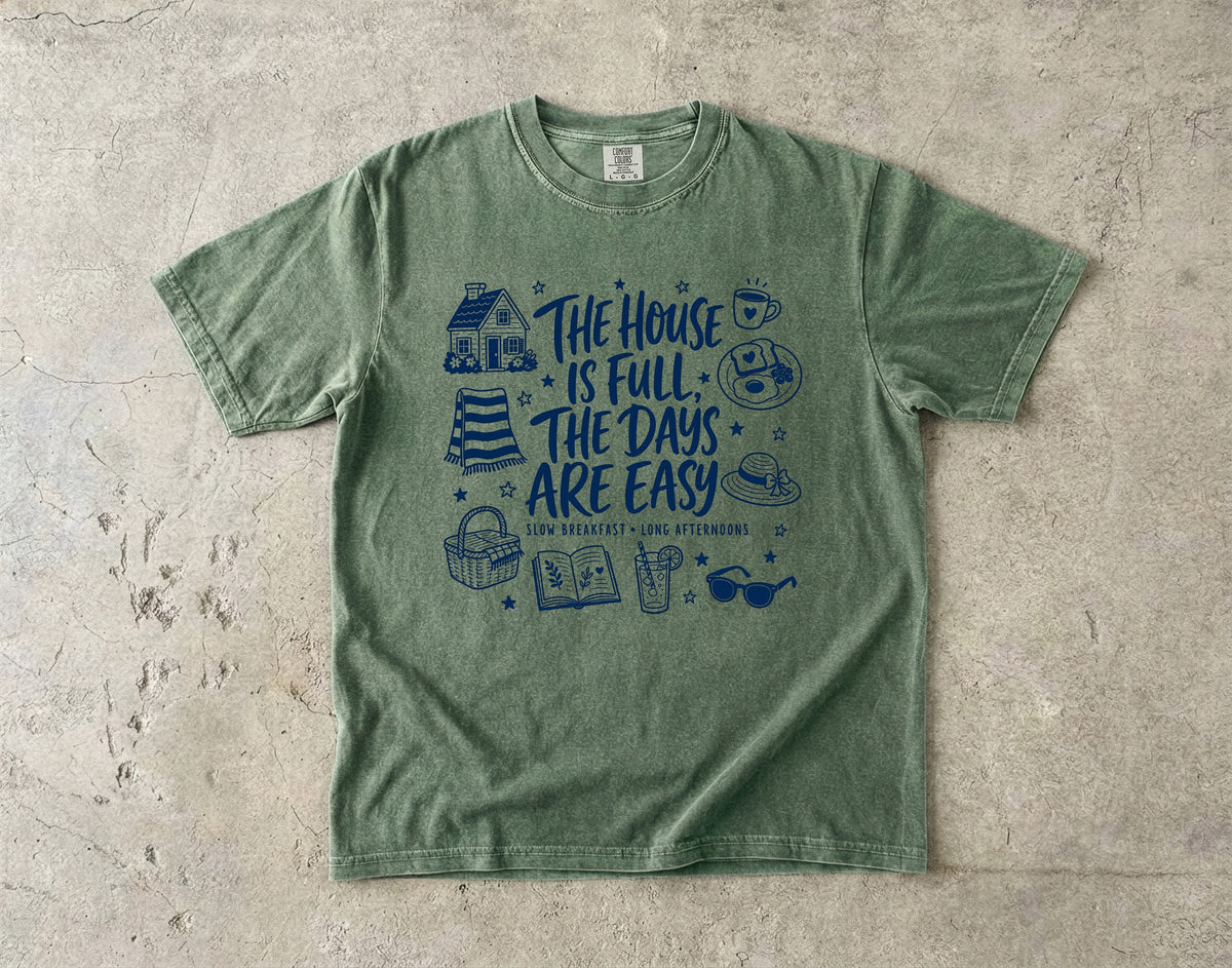 The House Is Full the Days Are Easy Family Getaway Shirt in Moss – flat lay