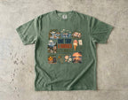 One Trip a Hundred Little Moments Family Travel Shirt in Moss – flat lay