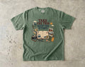 Take the Trip Keep the Story Road Trip Shirt in Moss – flat lay