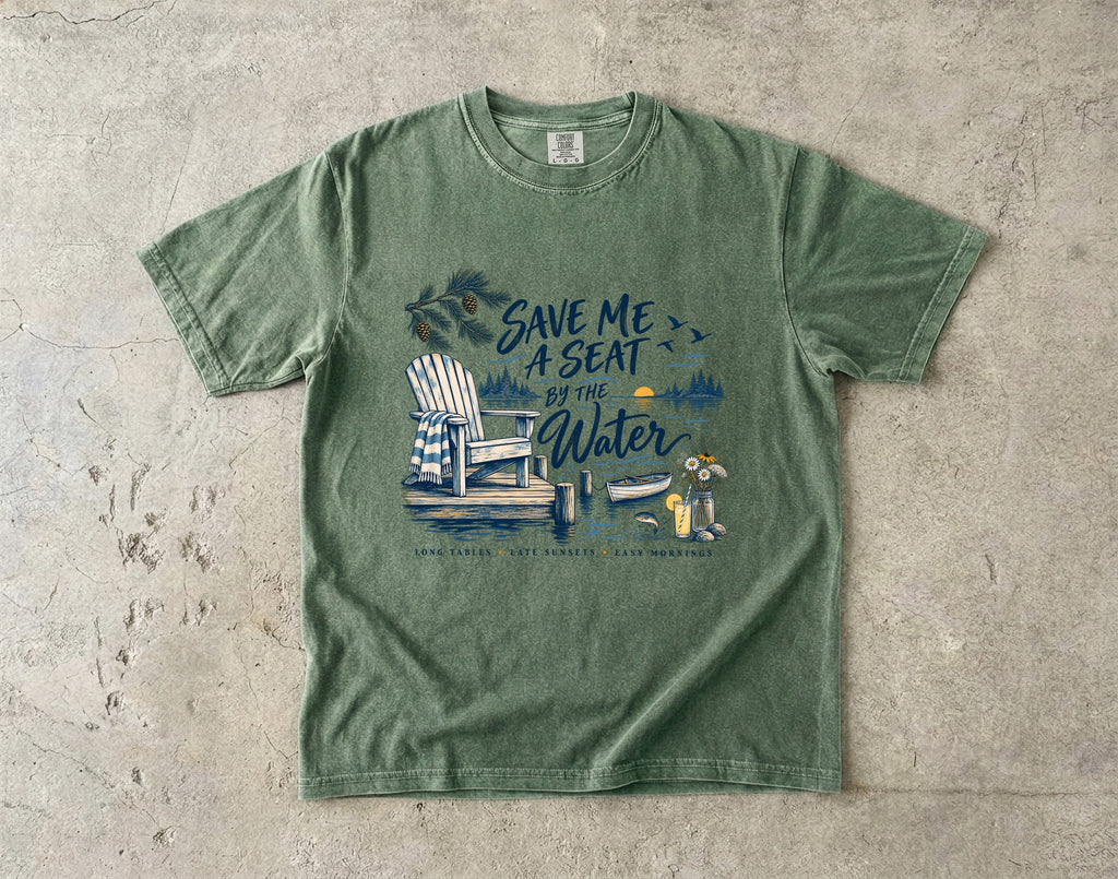 Save Me a Seat by the Water Lake Vacation Shirt in Moss – flat lay