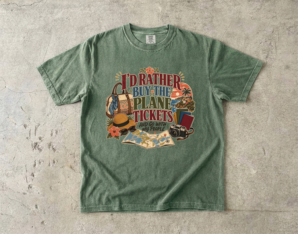 I'd Rather Buy the Plane Tickets Travel Mom Shirt in Moss – flat lay