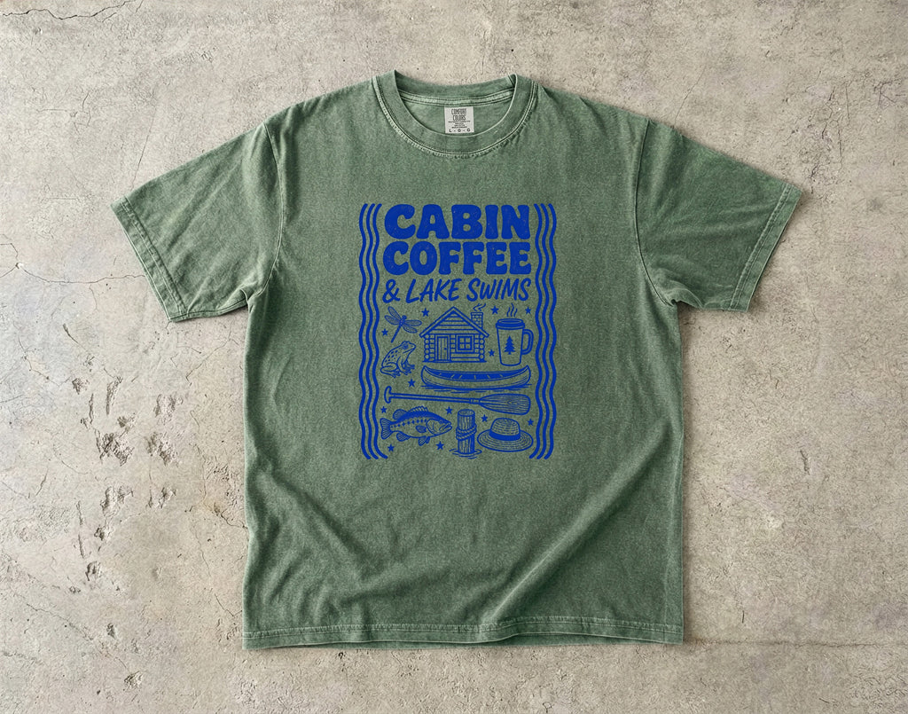 Cabin Coffee and Lake Swims Lake Vacation Shirt in Moss – flat lay