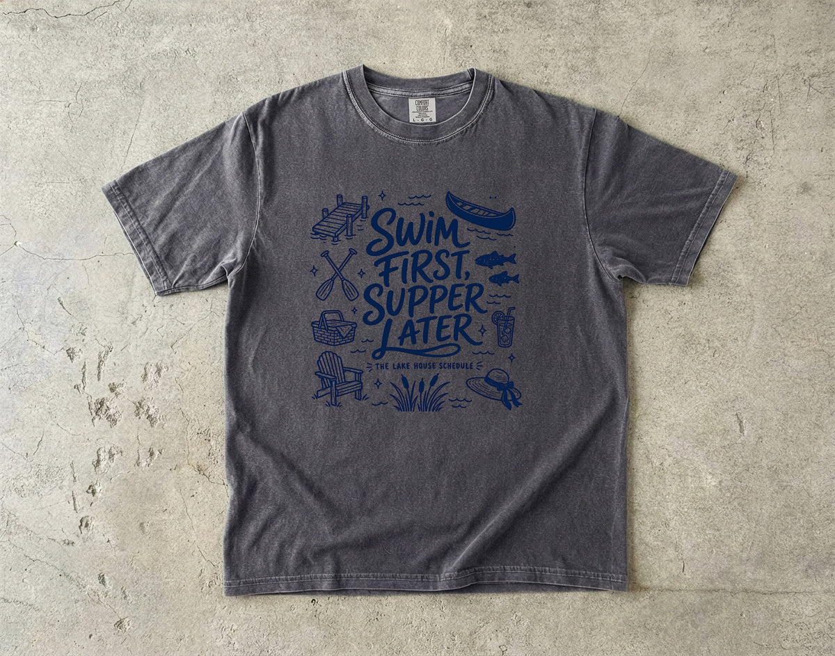 Swim First Supper Later Lake Vacation Shirt in Pepper – flat lay