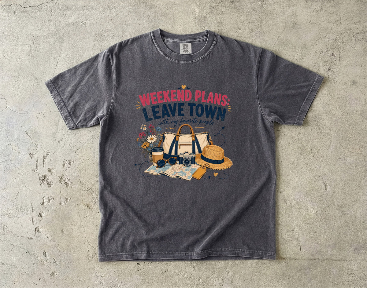 Weekend Plans Leave Town Girls Trip Shirt in Pepper – flat lay