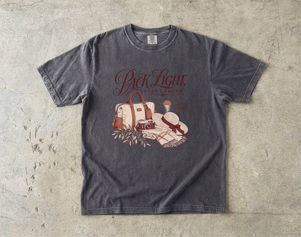 Pack Light Stay Longer Girls Trip Shirt in Pepper – flat lay