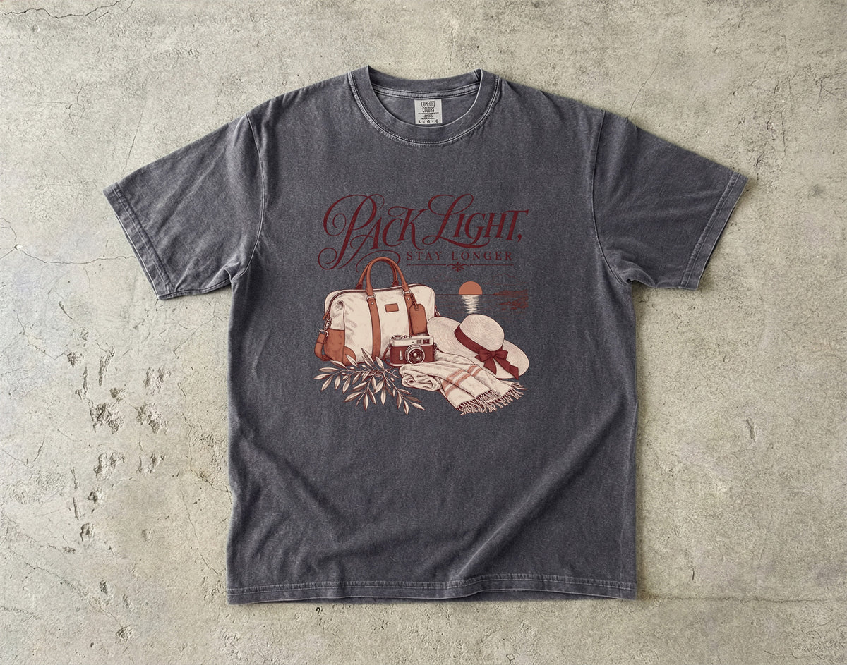 Pack Light Stay Longer Girls Trip Shirt in Pepper – flat lay