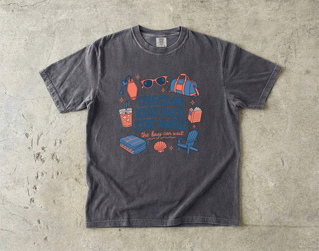 Check-In Kick Back Stay Awhile Family Getaway Shirt in Pepper – flat lay