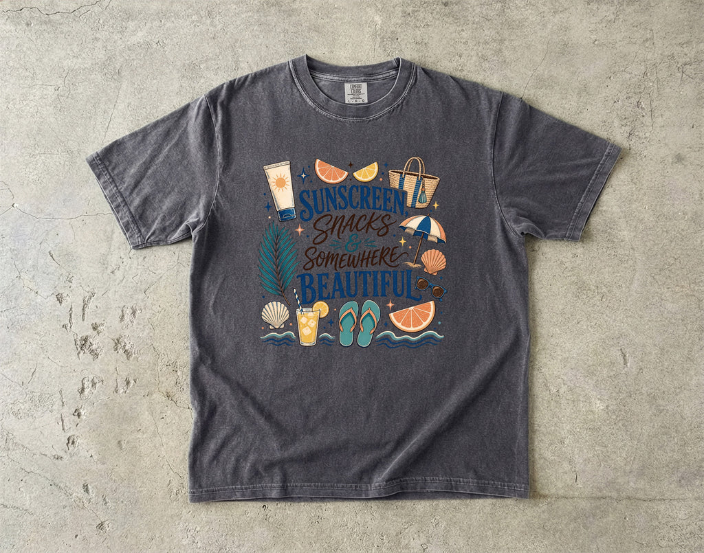 Sunscreen Snacks and Somewhere Beautiful Beach Vacation Shirt in Pepper – flat lay