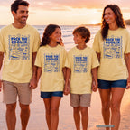 Pack the Cooler Find the Water Beach Vacation Shirt in Butter – worn on a family trip (AI-generated model photo)