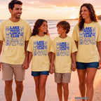 Lake House Lunch Club Youth Tee – Kids' Comfort Colors Lake Vacation Shirt in Butter – worn on a family trip (AI-generated model photo)