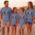 Under This Sky With These People Youth Tee – Kids' Comfort Colors Camping Shirt in Blue Jean – worn on a family trip (AI-generated model photo)