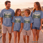 We Came for the View Youth Tee – Kids' Comfort Colors Mountain Adventure Shirt in Blue Jean – worn on a family trip (AI-generated model photo)
