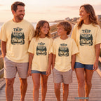The Trip Before the Story Youth Tee – Kids' Comfort Colors Travel Shirt in Butter – worn on a family trip (AI-generated model photo)