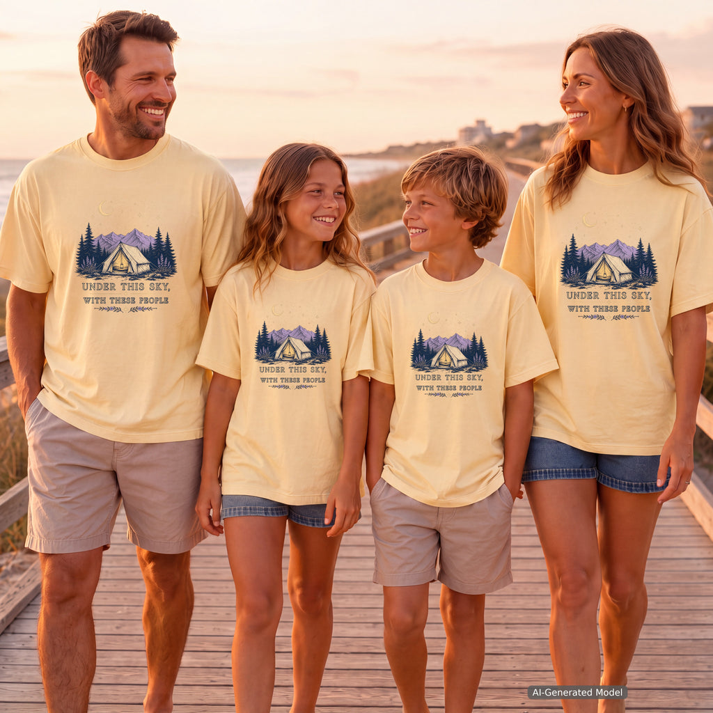 Under This Sky With These People Youth Tee – Kids' Comfort Colors Camping Shirt in Butter – worn on a family trip (AI-generated model photo)