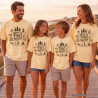 Under the Pines Together Youth Tee – Kids' Comfort Colors Camping Shirt in Butter – worn on a family trip (AI-generated model photo)