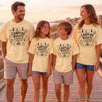 Campfire Nights and Morning Coffee Youth Tee – Kids' Comfort Colors Camping Shirt in Butter – worn on a family trip (AI-generated model photo)