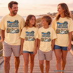 Lake Days Long Dinners Youth Tee – Kids' Comfort Colors Lake Vacation Shirt in Butter – worn on a family trip (AI-generated model photo)