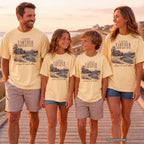 A Little Farther from Routine Youth Tee – Kids' Comfort Colors Family Getaway Shirt in Butter – worn on a family trip (AI-generated model photo)