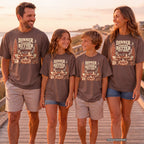 Dinner Tastes Better Out Here Camping Shirt in Espresso – worn on a family trip (AI-generated model photo)