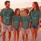 A Little Farther from Home Family Adventure Shirt in Moss – worn on a family trip (AI-generated model photo)