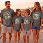 The Best Part Is Going Together Youth Tee – Kids' Comfort Colors Road Trip Shirt in Pepper – worn on a family trip (AI-generated model photo)