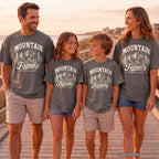 Family Mountain Escape Youth Tee – Kids' Comfort Colors Cabin Weekend Shirt in Pepper – worn on a family trip (AI-generated model photo)