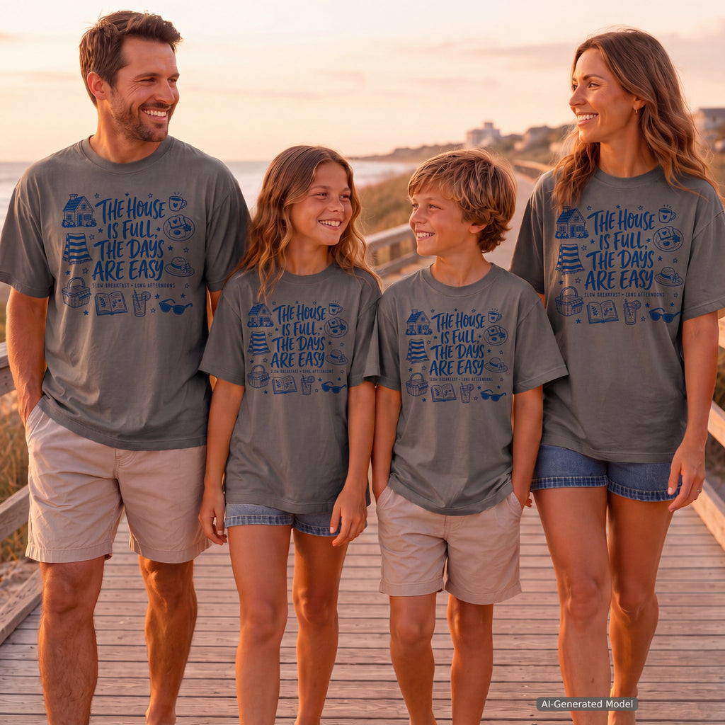 The House Is Full the Days Are Easy Youth Tee – Kids' Comfort Colors Family Getaway Shirt in Pepper – worn on a family trip (AI-generated model photo)