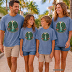 Chasing Waterfalls Together Youth Tee – Kids' Comfort Colors Adventure Shirt in Blue Jean – worn on a family trip (AI-generated model photo)