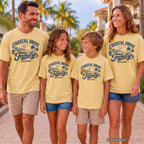 Coastal Drive Family Escape Youth Tee – Kids' Comfort Colors Beach Vacation Shirt in Butter – worn on a family trip (AI-generated model photo)