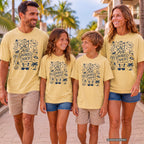 Salt Air Shared Snacks Youth Tee – Kids' Comfort Colors Beach Vacation Shirt in Butter – worn on a family trip (AI-generated model photo)