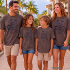 Shared Rooms and Ocean Views Girls Trip Shirt in Espresso – worn on a family trip (AI-generated model photo)