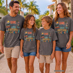 Same People New Postcard Youth Tee – Kids' Comfort Colors Road Trip Shirt in Pepper – worn on a family trip (AI-generated model photo)
