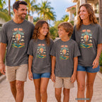 Up Up and Off We Go Youth Tee – Kids' Comfort Colors Hot Air Balloon Shirt in Pepper – worn on a family trip (AI-generated model photo)