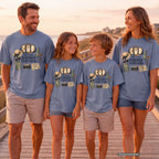Pack Light Remember Everything Travel Planning Shirt in Blue Jean – worn on a family trip (AI-generated model photo)